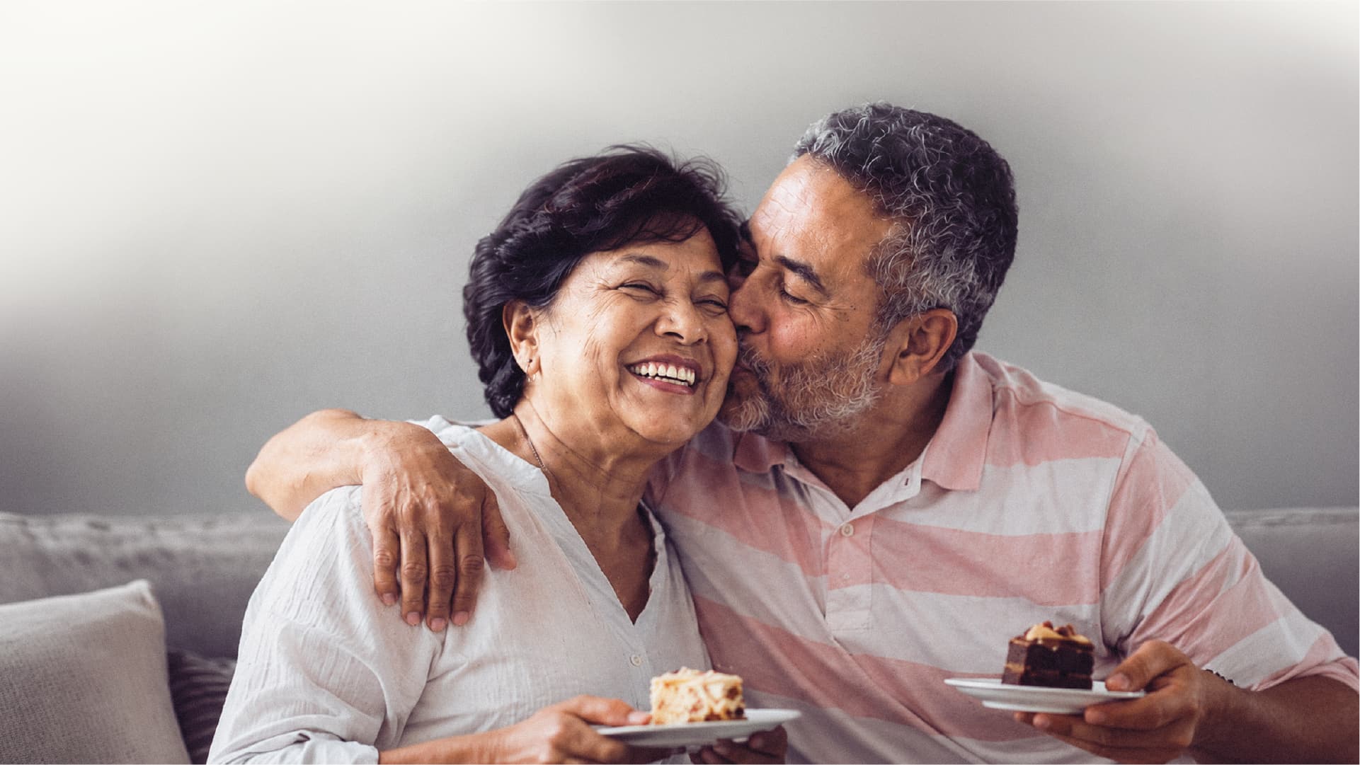 An elderly couple sharing a quiet moment together